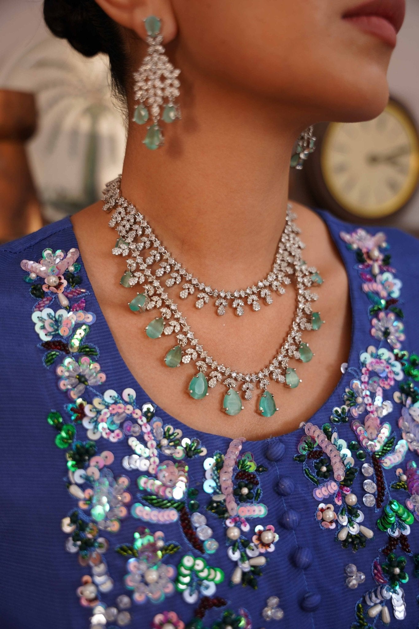 • Clothing: Embroidered/Printed suit for women - Made of best quality fabric - lawn or linen or chiffon - pure silk - Available at Najma Designs & Co. • Jewelry: Gold - plated stud earrings for