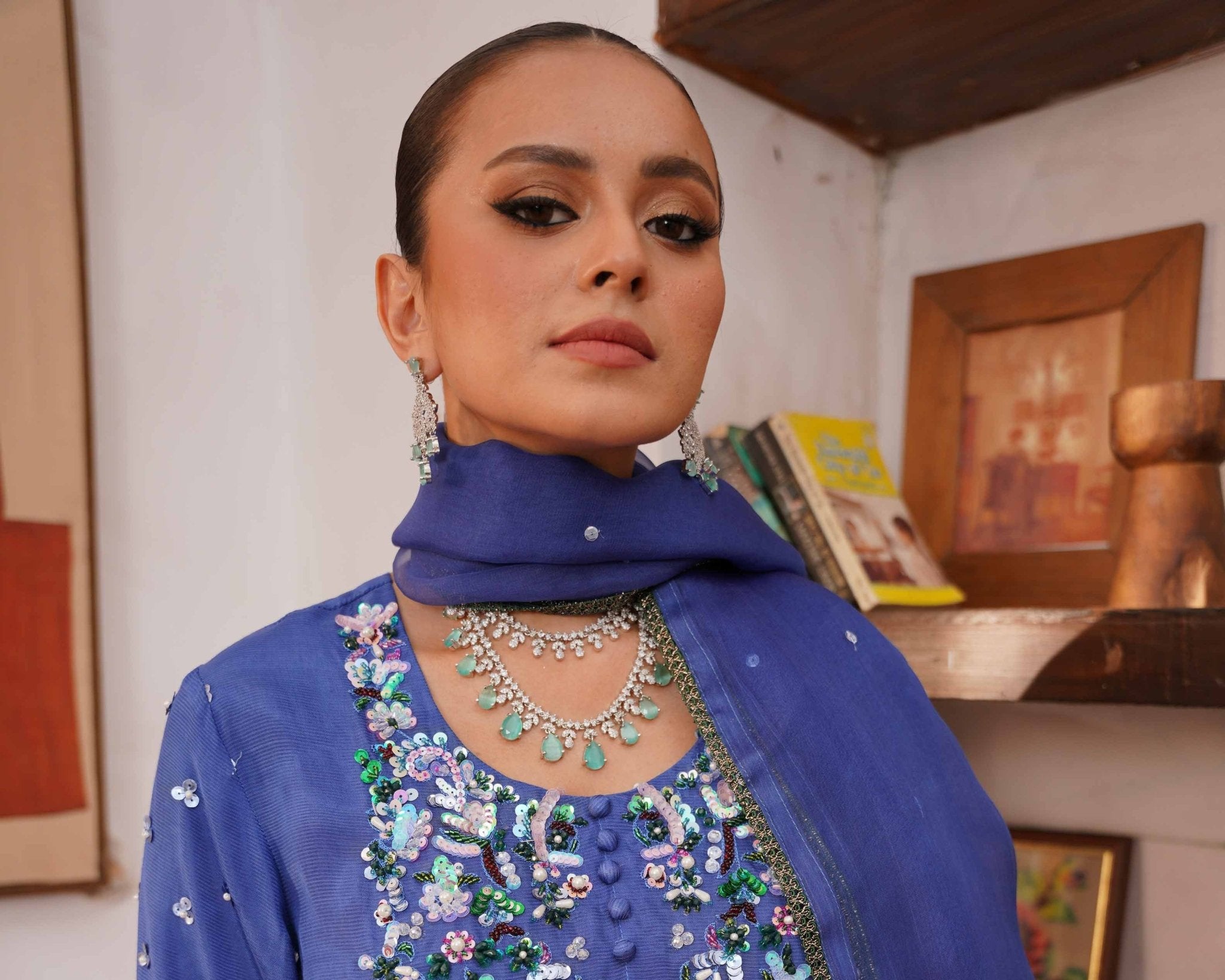 • Clothing: Embroidered/Printed suit for women - Made of best quality fabric - lawn or linen or chiffon - pure silk - Available at Najma Designs & Co. • Jewelry: Gold - plated stud earrings for