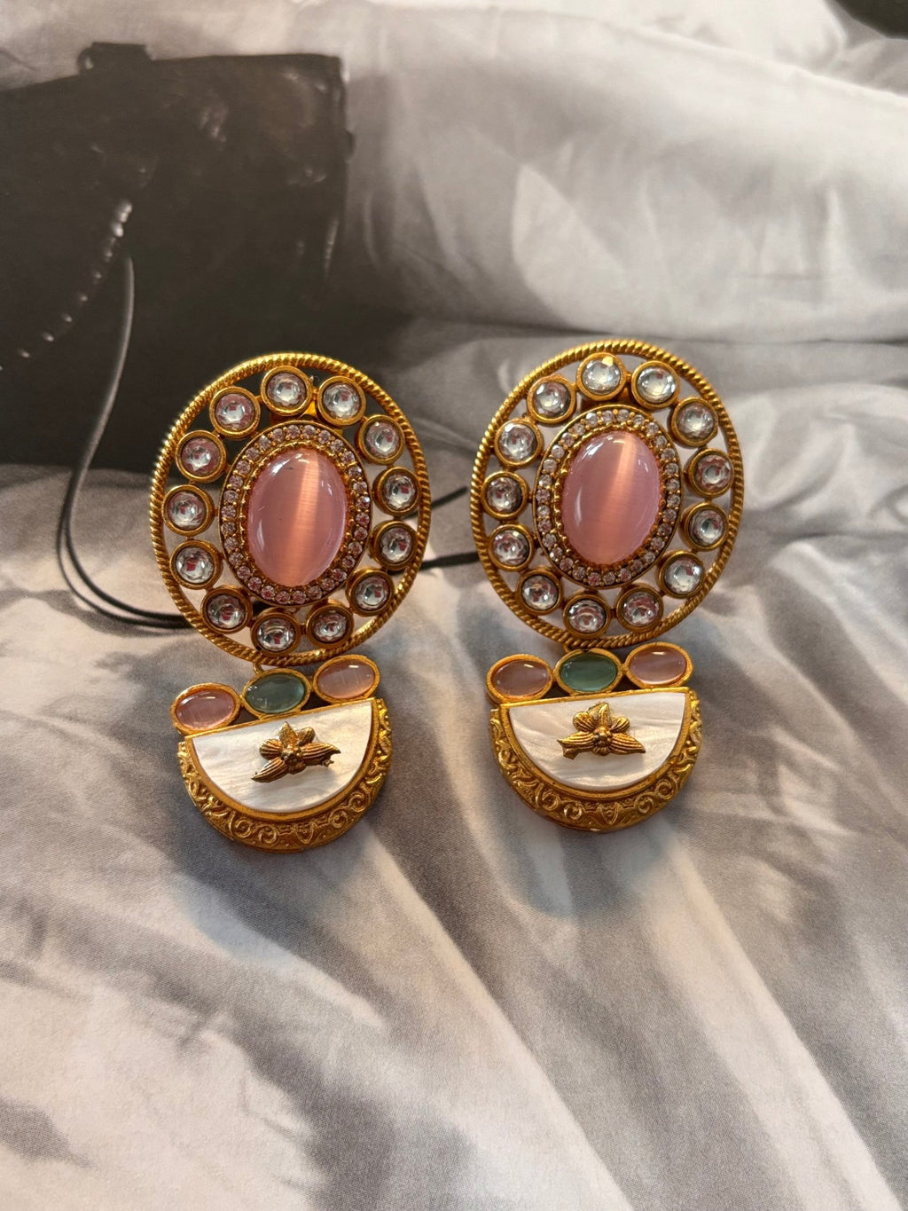 • Clothing: Embroidered/Printed suit for women - Made of best quality fabric - lawn or linen or chiffon - pure silk - Available at Najma Designs & Co. • Jewelry: Gold - plated stud earrings for