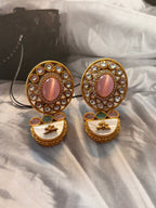• Clothing: Embroidered/Printed suit for women - Made of best quality fabric - lawn or linen or chiffon - pure silk - Available at Najma Designs & Co. • Jewelry: Gold - plated stud earrings for