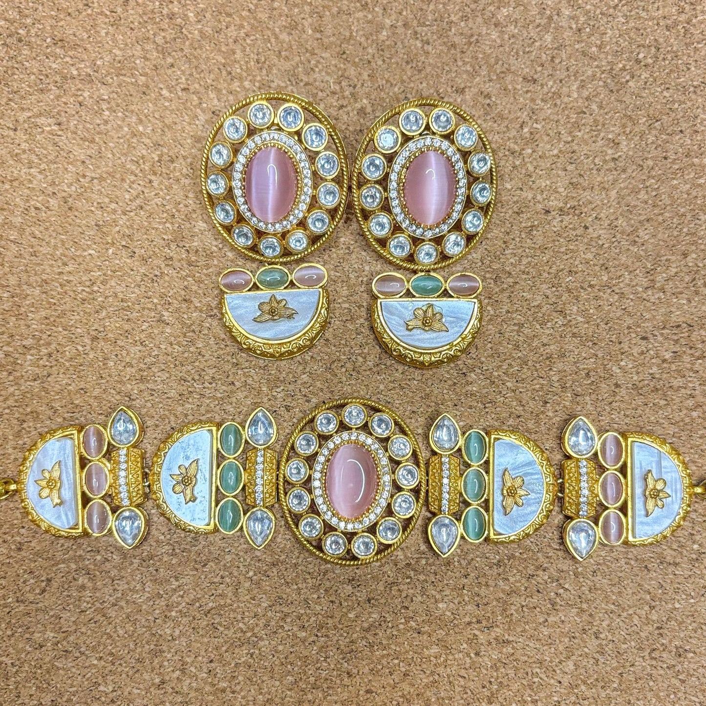 • Clothing: Embroidered/Printed suit for women - Made of best quality fabric - lawn or linen or chiffon - pure silk - Available at Najma Designs & Co. • Jewelry: Gold - plated stud earrings for