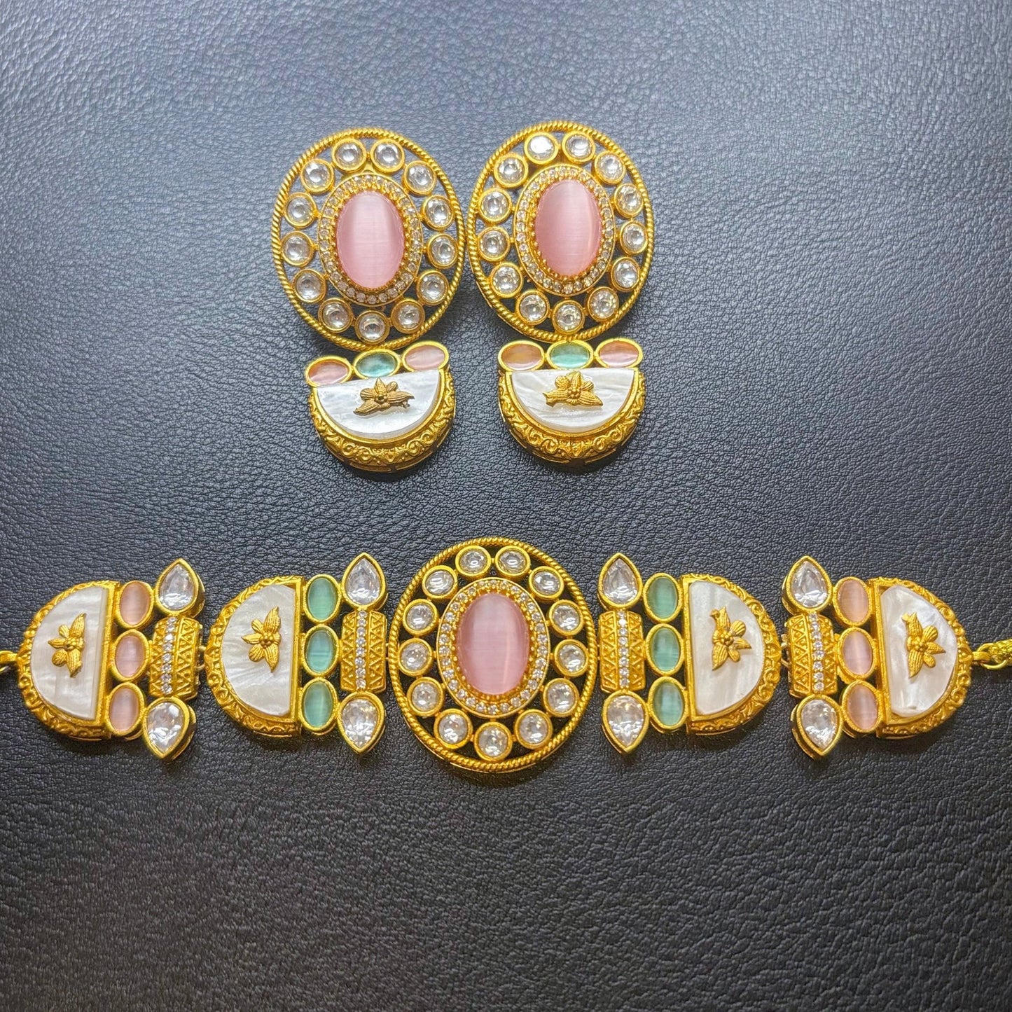 • Clothing: Embroidered/Printed suit for women - Made of best quality fabric - lawn or linen or chiffon - pure silk - Available at Najma Designs & Co. • Jewelry: Gold - plated stud earrings for