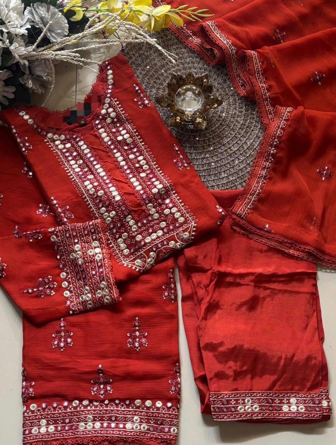 • Clothing: Embroidered/Printed suit for women - Made of best quality fabric - lawn or linen or chiffon - pure silk - Available at Najma Designs & Co. • Jewelry: Gold - plated stud earrings for
