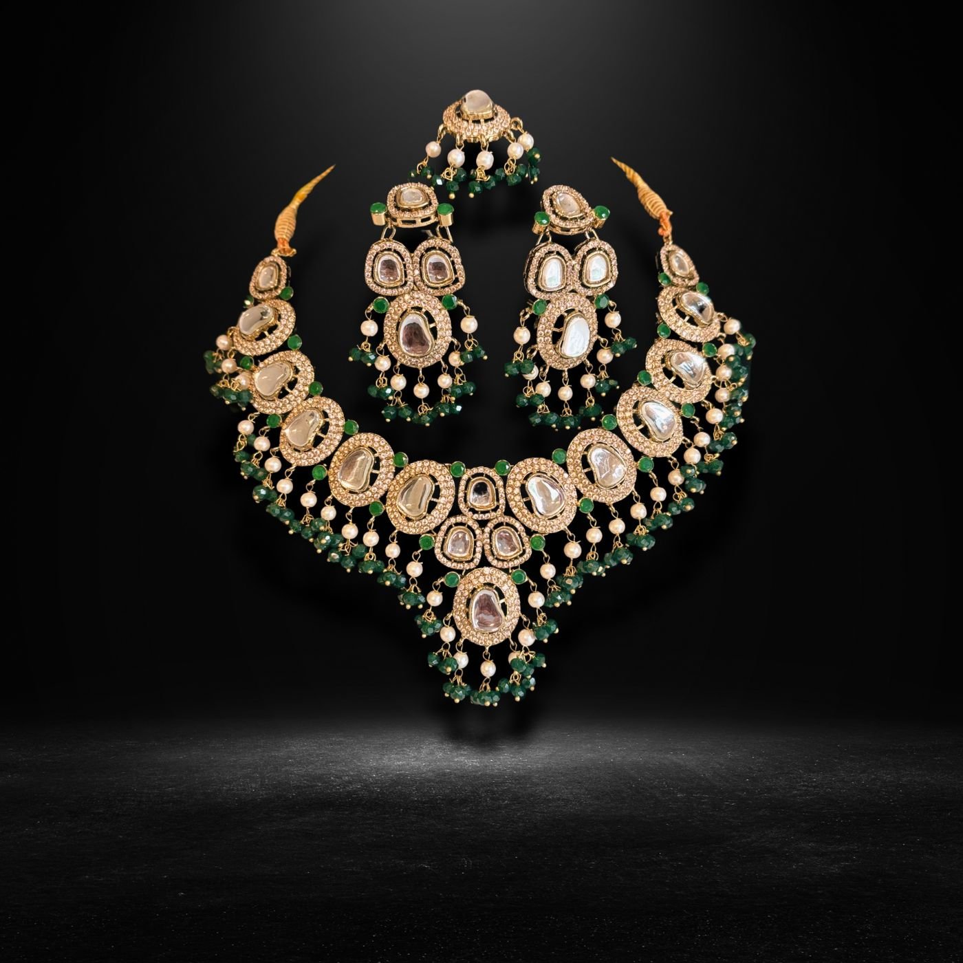 • Clothing: Embroidered/Printed suit for women - Made of best quality fabric - lawn or linen or chiffon - pure silk - Available at Najma Designs & Co. • Jewelry: Gold - plated stud earrings for