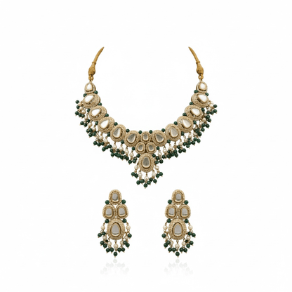 • Clothing: Embroidered/Printed suit for women - Made of best quality fabric - lawn or linen or chiffon - pure silk - Available at Najma Designs & Co. • Jewelry: Gold - plated stud earrings for