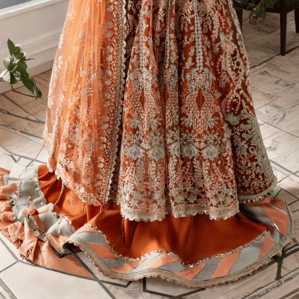 • Clothing: Embroidered/Printed suit for women - Made of best quality fabric - lawn or linen or chiffon - pure silk - Available at Najma Designs & Co. • Jewelry: Gold - plated stud earrings for