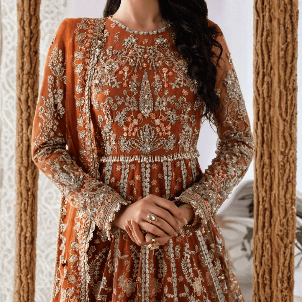• Clothing: Embroidered/Printed suit for women - Made of best quality fabric - lawn or linen or chiffon - pure silk - Available at Najma Designs & Co. • Jewelry: Gold - plated stud earrings for