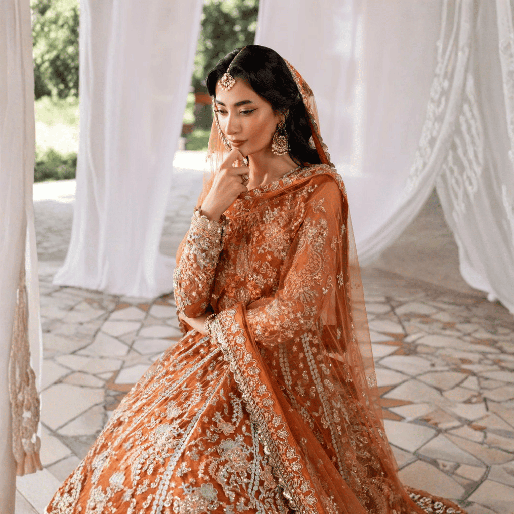 • Clothing: Embroidered/Printed suit for women - Made of best quality fabric - lawn or linen or chiffon - pure silk - Available at Najma Designs & Co. • Jewelry: Gold - plated stud earrings for