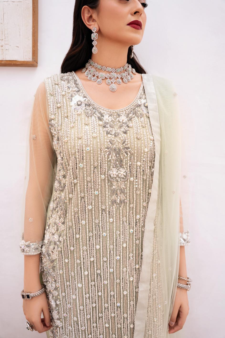• Clothing: Embroidered/Printed suit for women - Made of best quality fabric - lawn or linen or chiffon - pure silk - Available at Najma Designs & Co. • Jewelry: Gold - plated stud earrings for