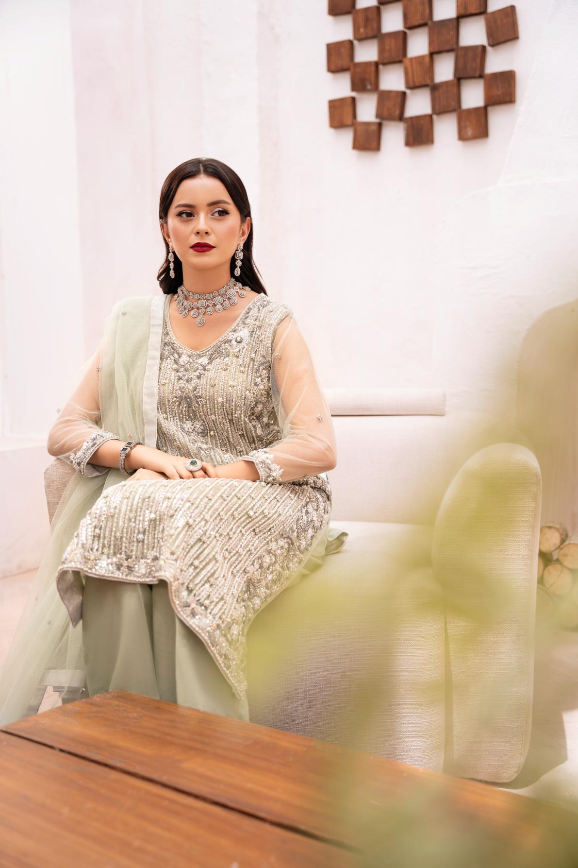 • Clothing: Embroidered/Printed suit for women - Made of best quality fabric - lawn or linen or chiffon - pure silk - Available at Najma Designs & Co. • Jewelry: Gold - plated stud earrings for