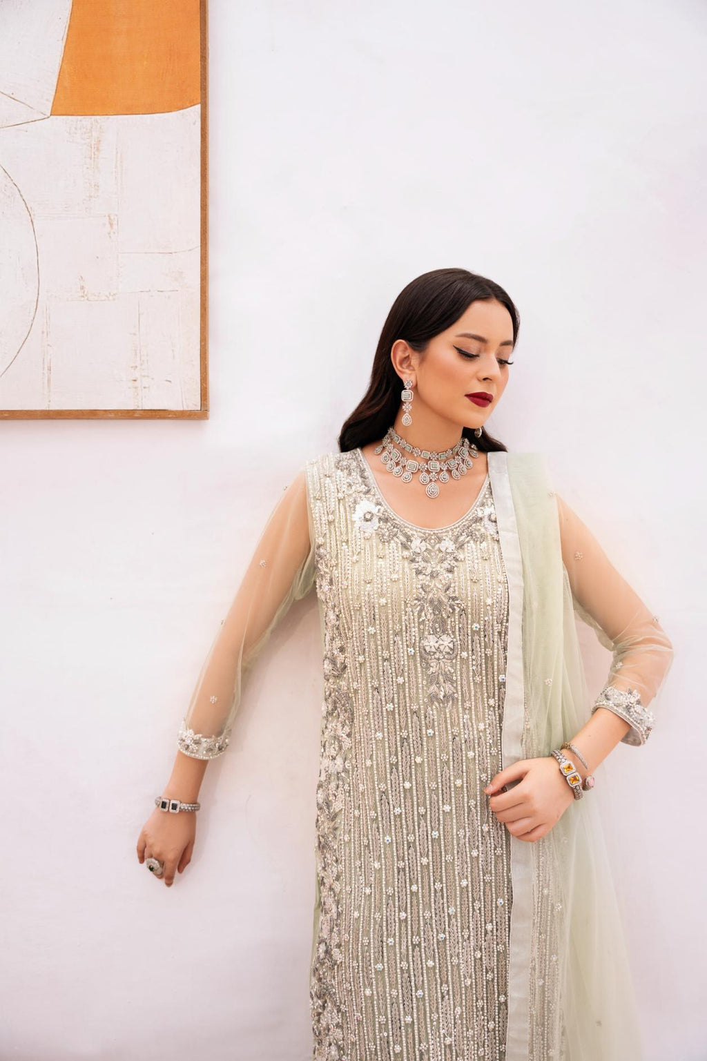 • Clothing: Embroidered/Printed suit for women - Made of best quality fabric - lawn or linen or chiffon - pure silk - Available at Najma Designs & Co. • Jewelry: Gold - plated stud earrings for