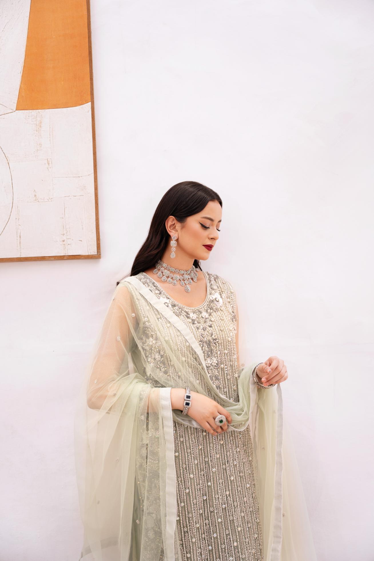 • Clothing: Embroidered/Printed suit for women - Made of best quality fabric - lawn or linen or chiffon - pure silk - Available at Najma Designs & Co. • Jewelry: Gold - plated stud earrings for