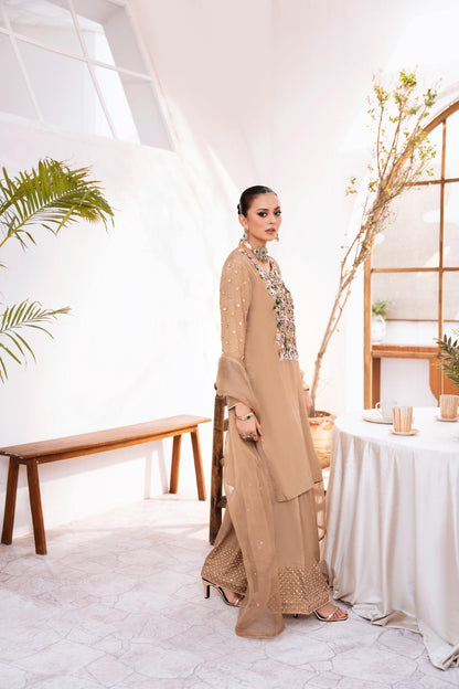 • Clothing: Embroidered/Printed suit for women - Made of best quality fabric - lawn or linen or chiffon - pure silk - Available at Najma Designs & Co. • Jewelry: Gold - plated stud earrings for
