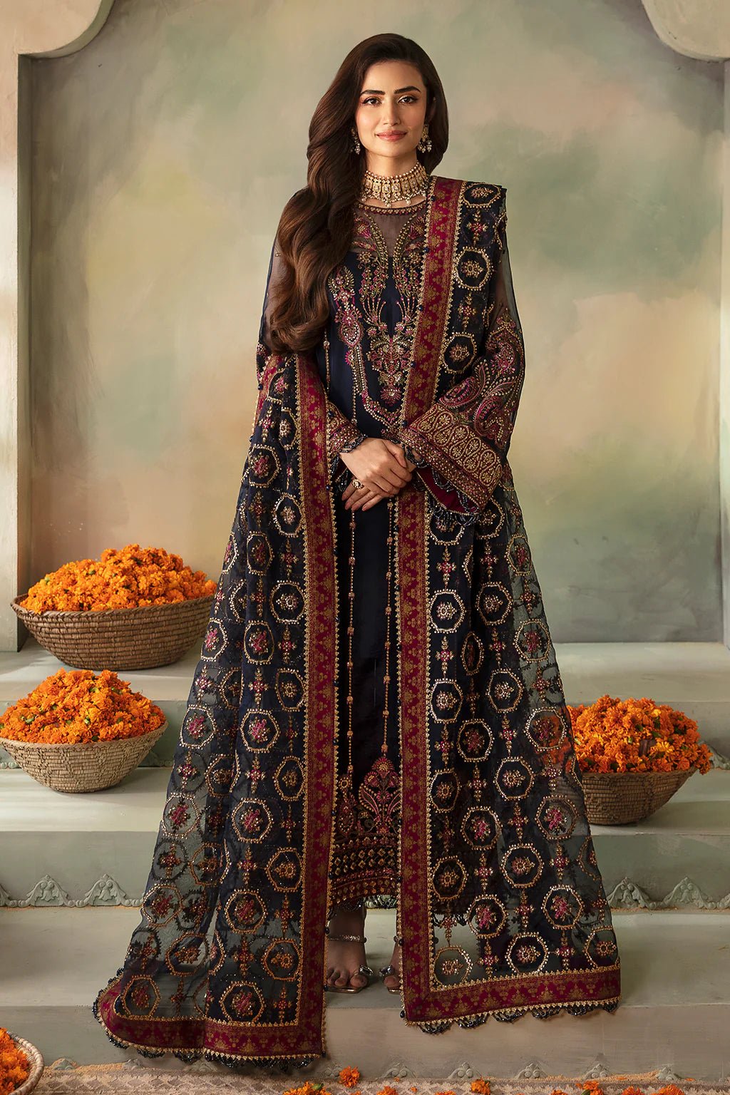 • Clothing: Embroidered/Printed suit for women - Made of best quality fabric - lawn or linen or chiffon- pure silk - Available at Najma Designs & Co. • Jewelry: Gold-plated stud earrings for