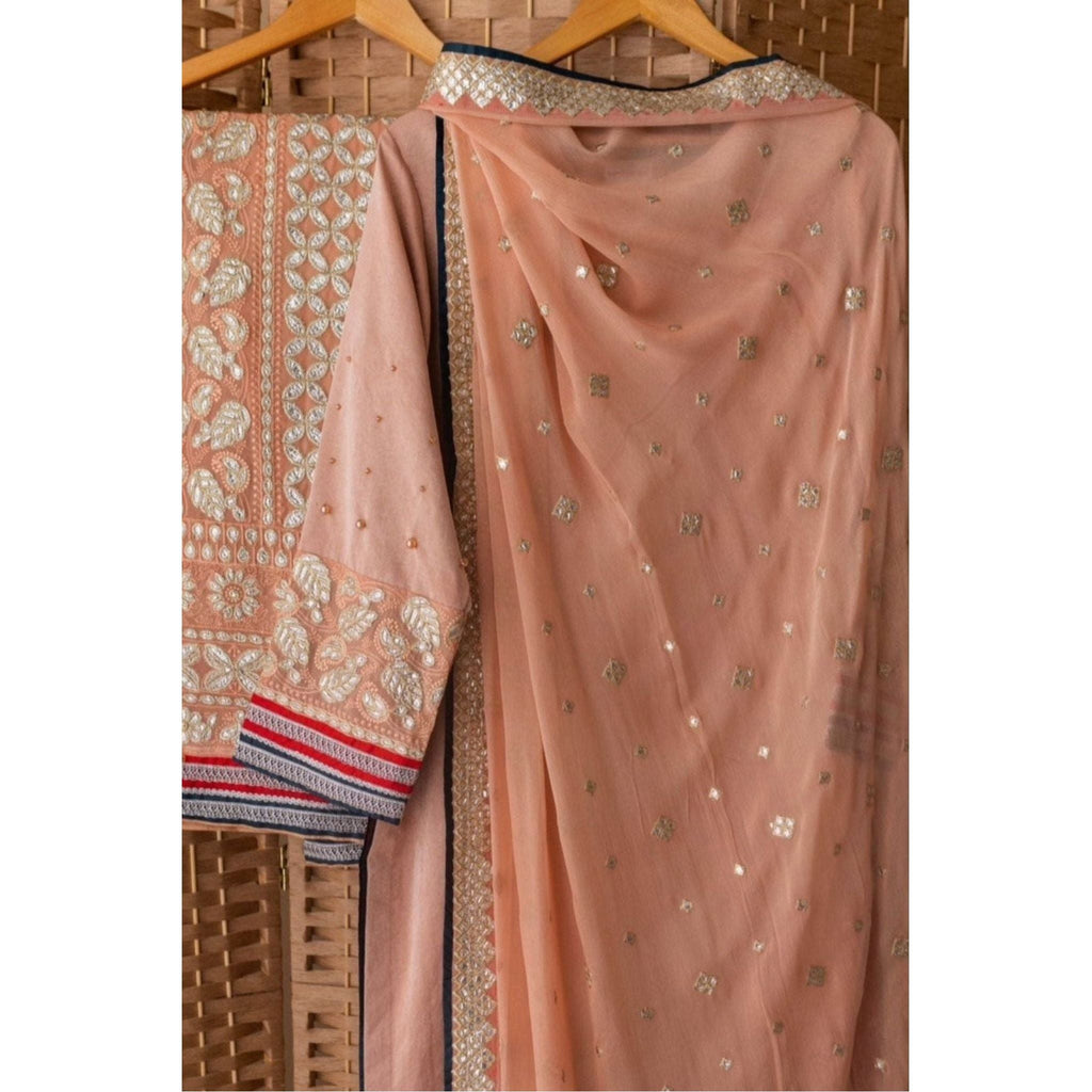 Chicken Karri Shalwar and dupatta with Silk and Moti Work with tilla Lace.
outfit color is Peach color 