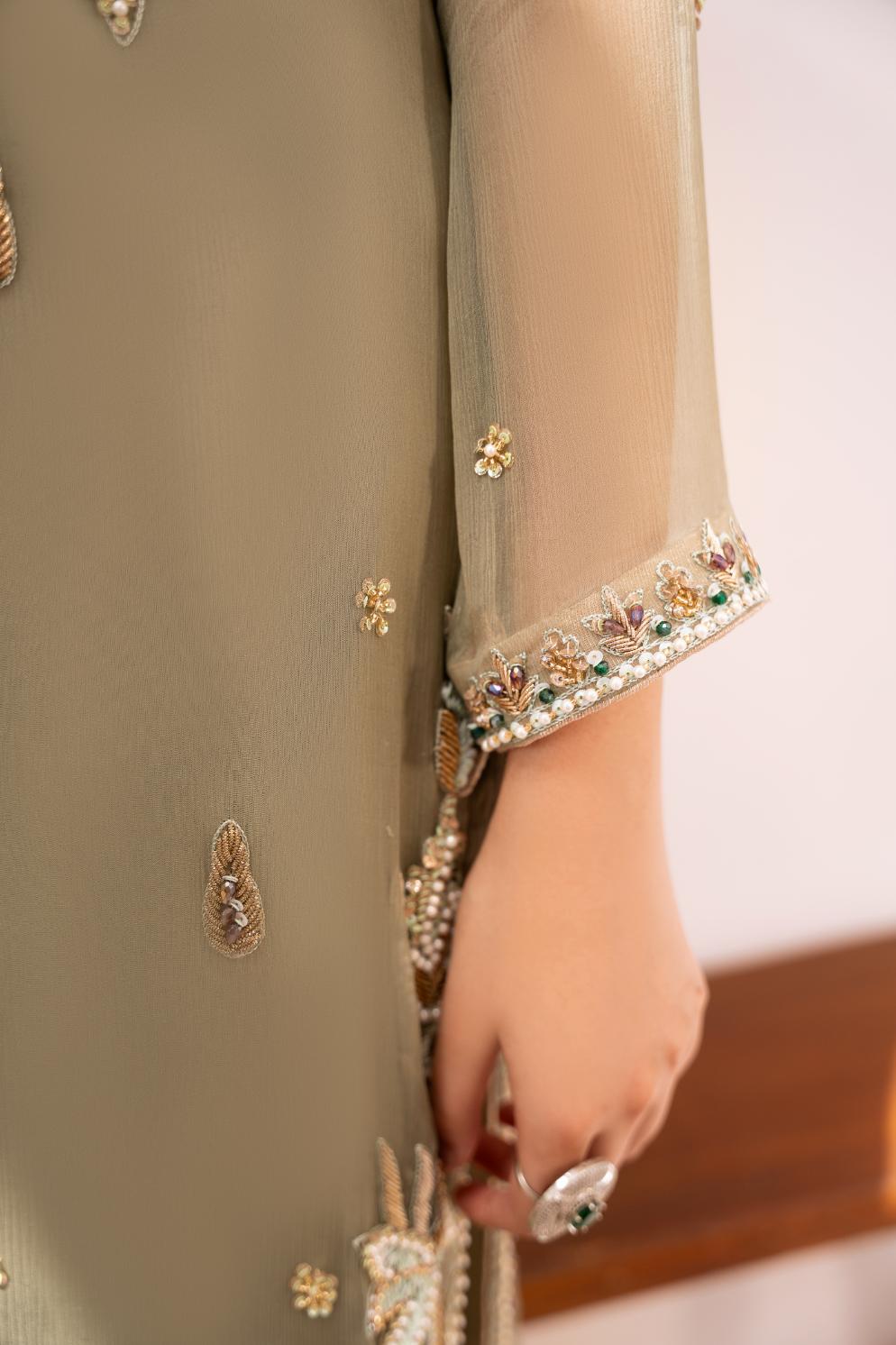 • Clothing: Embroidered/Printed suit for women - Made of best quality fabric - lawn or linen or chiffon - pure silk - Available at Najma Designs & Co. • Jewelry: Gold - plated stud earrings for