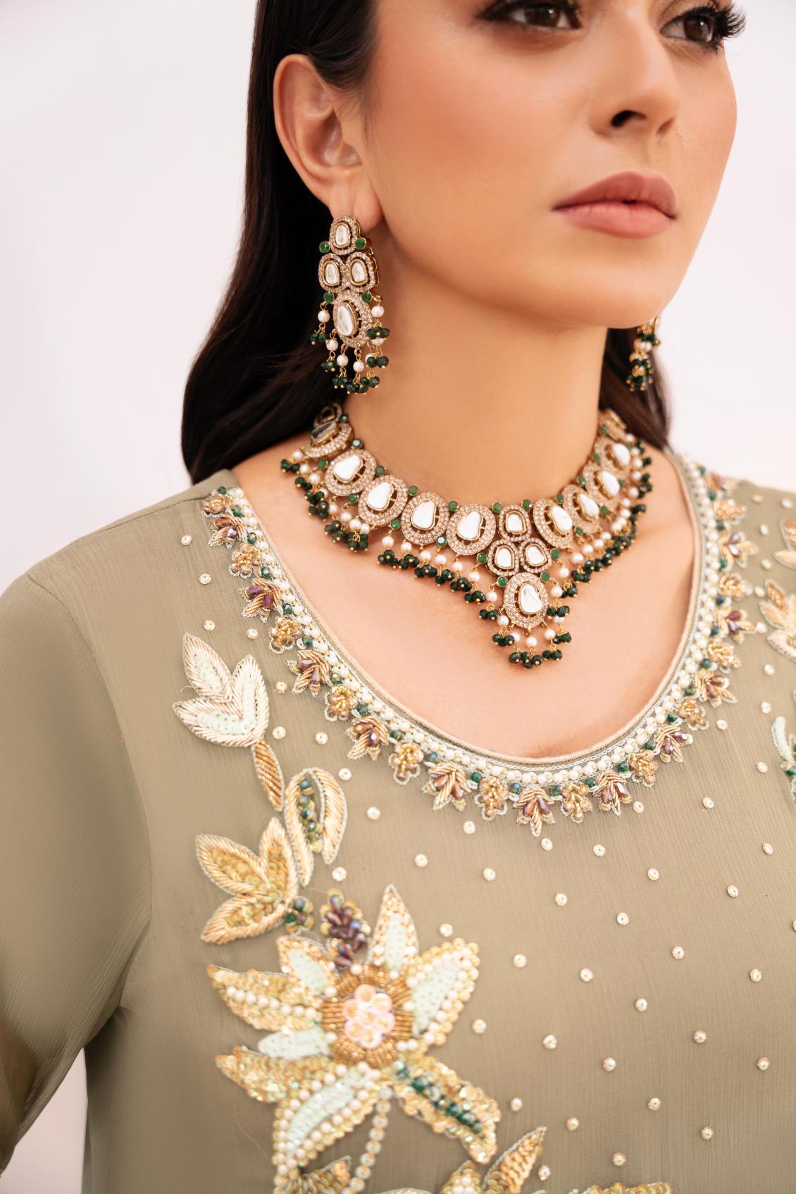 • Clothing: Embroidered/Printed suit for women - Made of best quality fabric - lawn or linen or chiffon - pure silk - Available at Najma Designs & Co. • Jewelry: Gold - plated stud earrings for