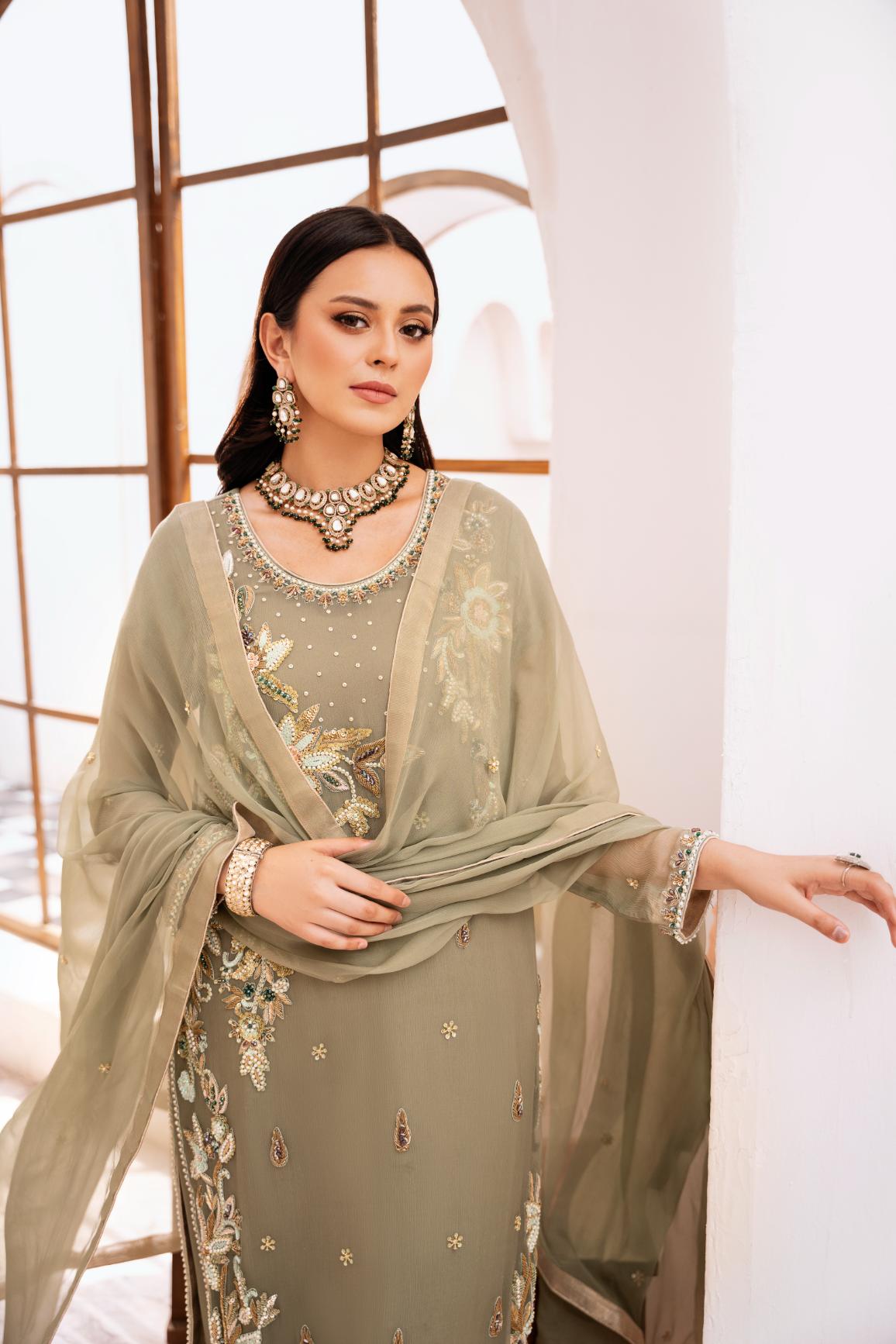• Clothing: Embroidered/Printed suit for women - Made of best quality fabric - lawn or linen or chiffon - pure silk - Available at Najma Designs & Co. • Jewelry: Gold - plated stud earrings for