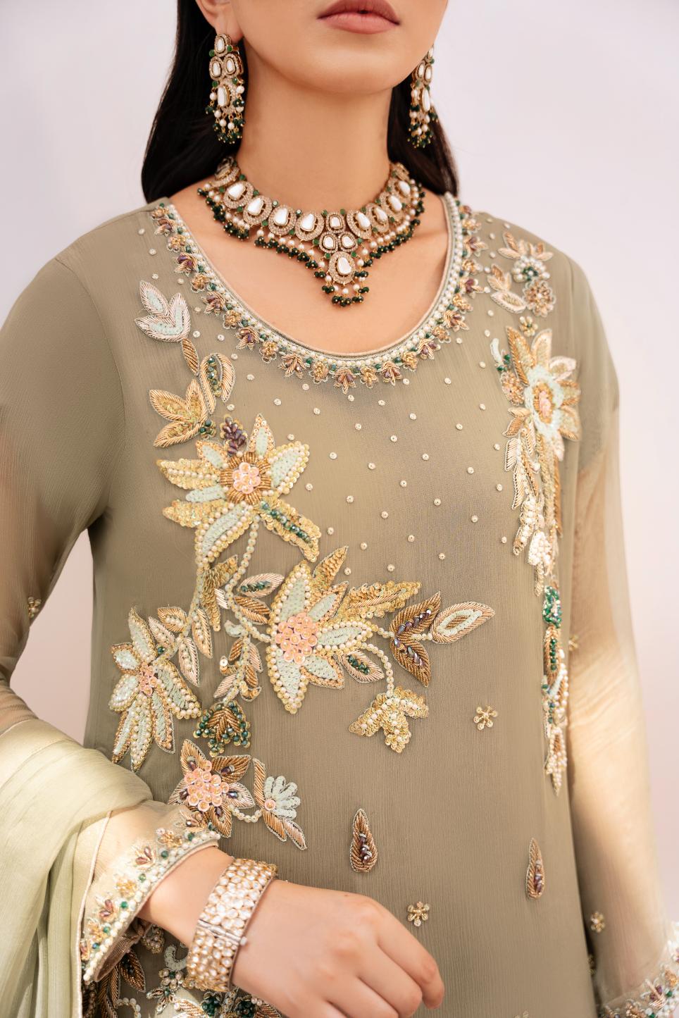 • Clothing: Embroidered/Printed suit for women - Made of best quality fabric - lawn or linen or chiffon - pure silk - Available at Najma Designs & Co. • Jewelry: Gold - plated stud earrings for