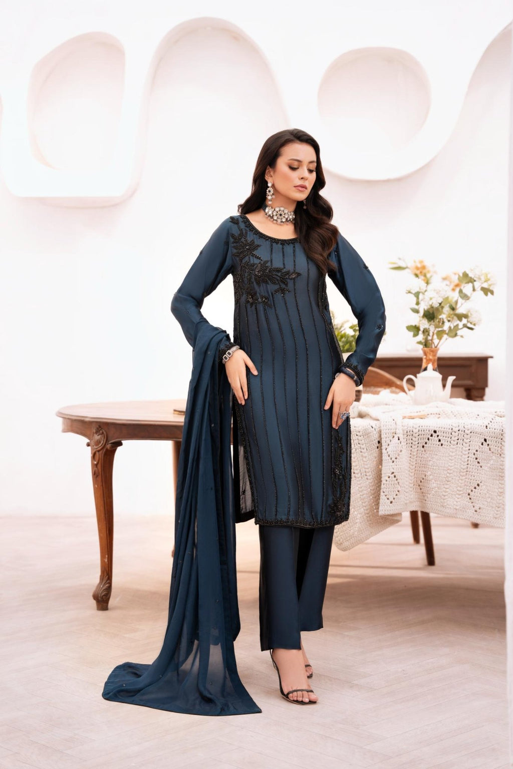 • Clothing: Embroidered/Printed suit for women - Made of best quality fabric - lawn or linen or chiffon - pure silk - Available at Najma Designs & Co. • Jewelry: Gold - plated stud earrings for