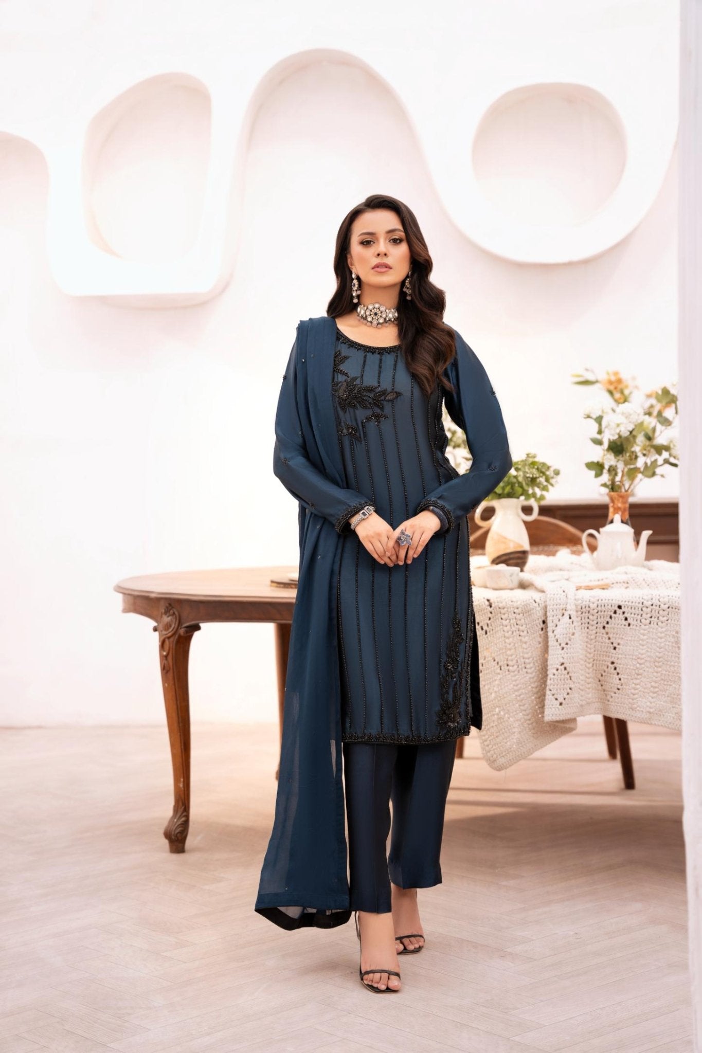 • Clothing: Embroidered/Printed suit for women - Made of best quality fabric - lawn or linen or chiffon - pure silk - Available at Najma Designs & Co. • Jewelry: Gold - plated stud earrings for