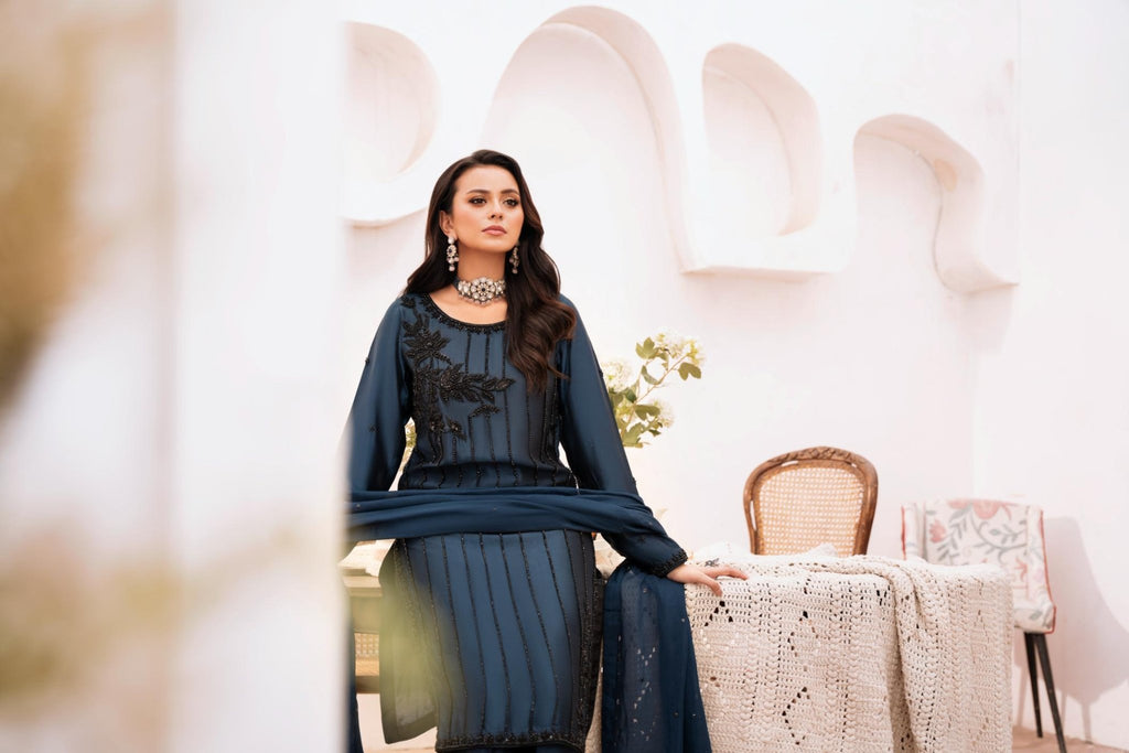 • Clothing: Embroidered/Printed suit for women - Made of best quality fabric - lawn or linen or chiffon - pure silk - Available at Najma Designs & Co. • Jewelry: Gold - plated stud earrings for