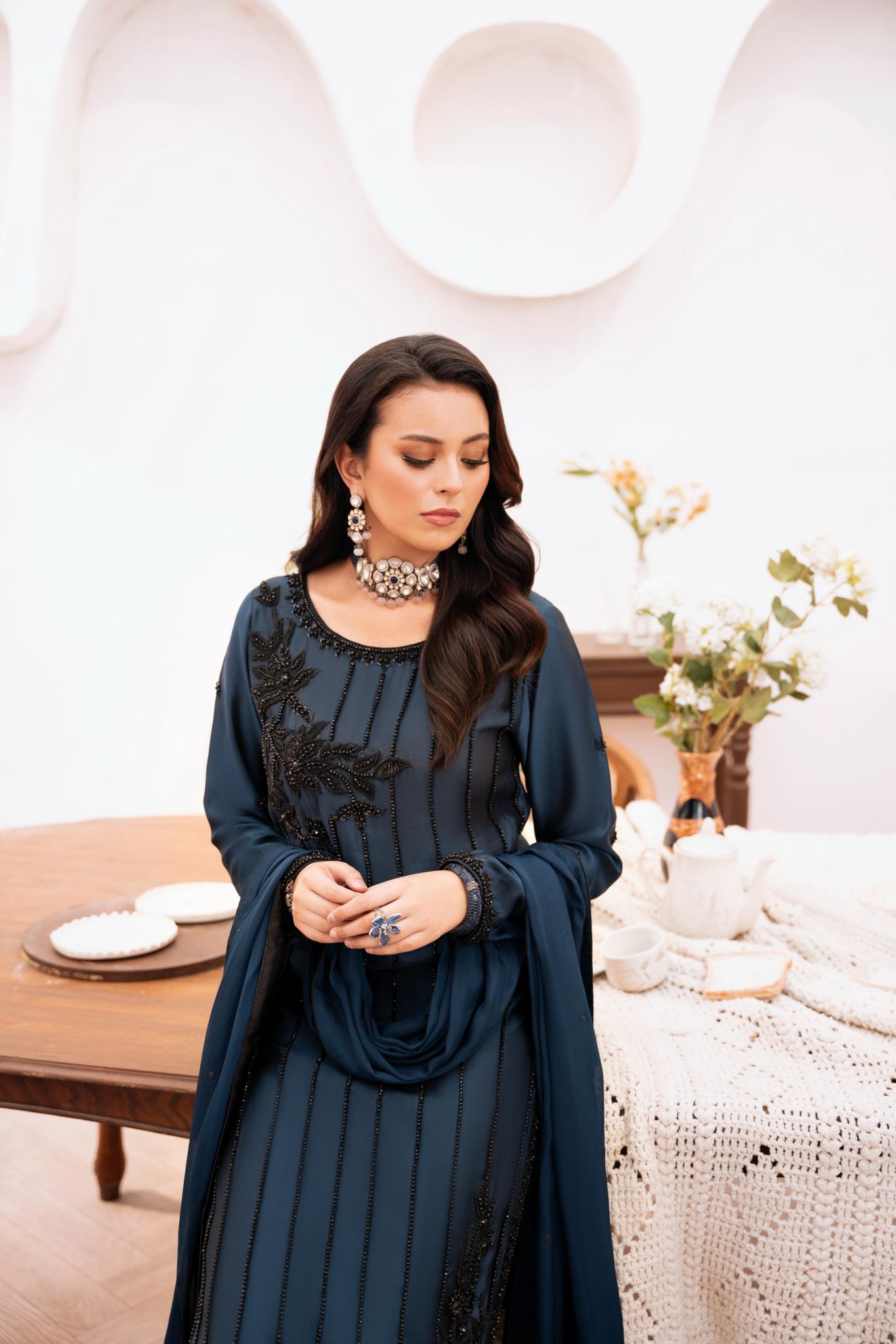 • Clothing: Embroidered/Printed suit for women - Made of best quality fabric - lawn or linen or chiffon - pure silk - Available at Najma Designs & Co. • Jewelry: Gold - plated stud earrings for