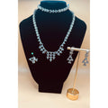 This Silver Crystal Necklace set showcases a beautifully designed triangle silver set, adorned with sparkling crystals. Perfect for formal occasions, this set includes a bracelet, earrings, ring, and necklace, adding an elegant touch to any outfit. Elevate your style with this stunning jewelry set.