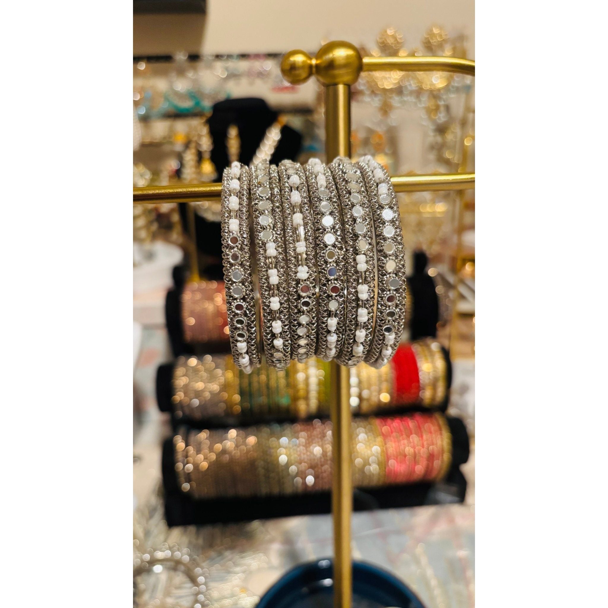 • Clothing: Embroidered/Printed suit for women - Made of best quality fabric - lawn or linen or chiffon - pure silk - Available at Najma Designs & Co. • Jewelry: Gold - plated stud earrings for