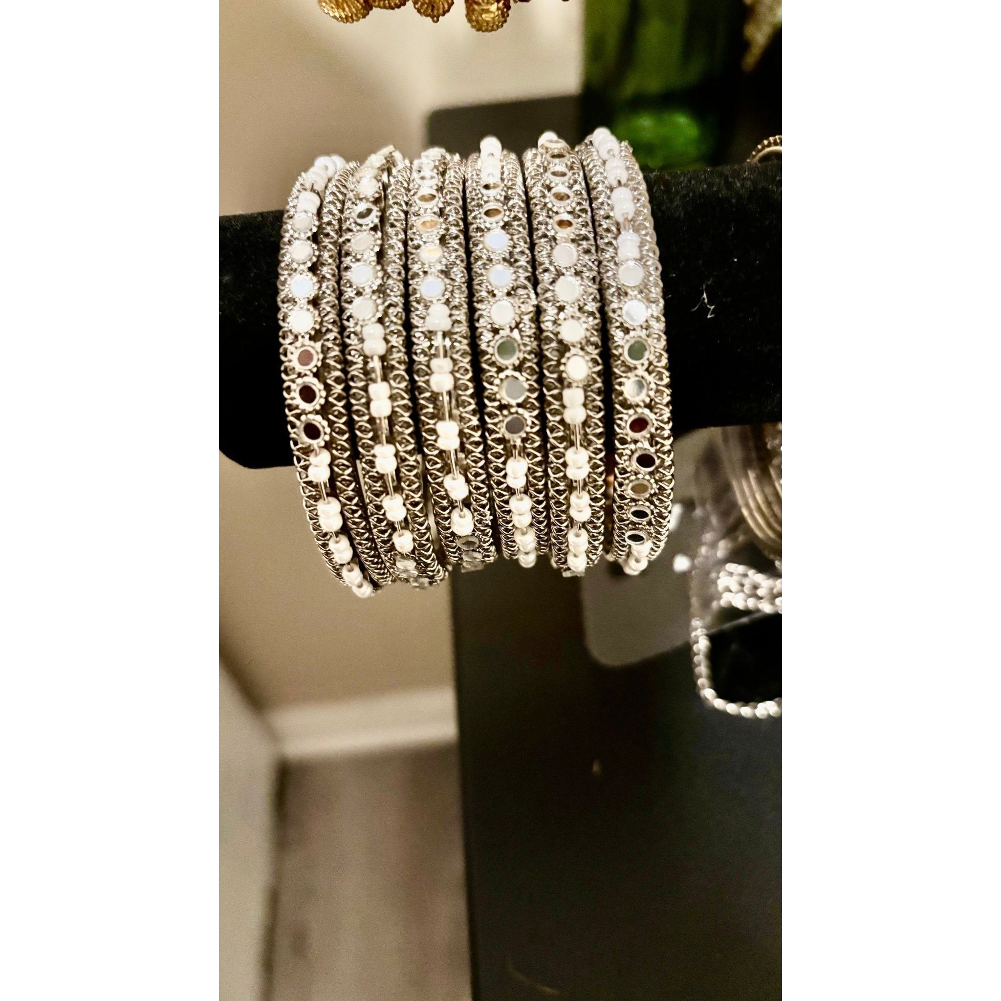 • Clothing: Embroidered/Printed suit for women - Made of best quality fabric - lawn or linen or chiffon - pure silk - Available at Najma Designs & Co. • Jewelry: Gold - plated stud earrings for