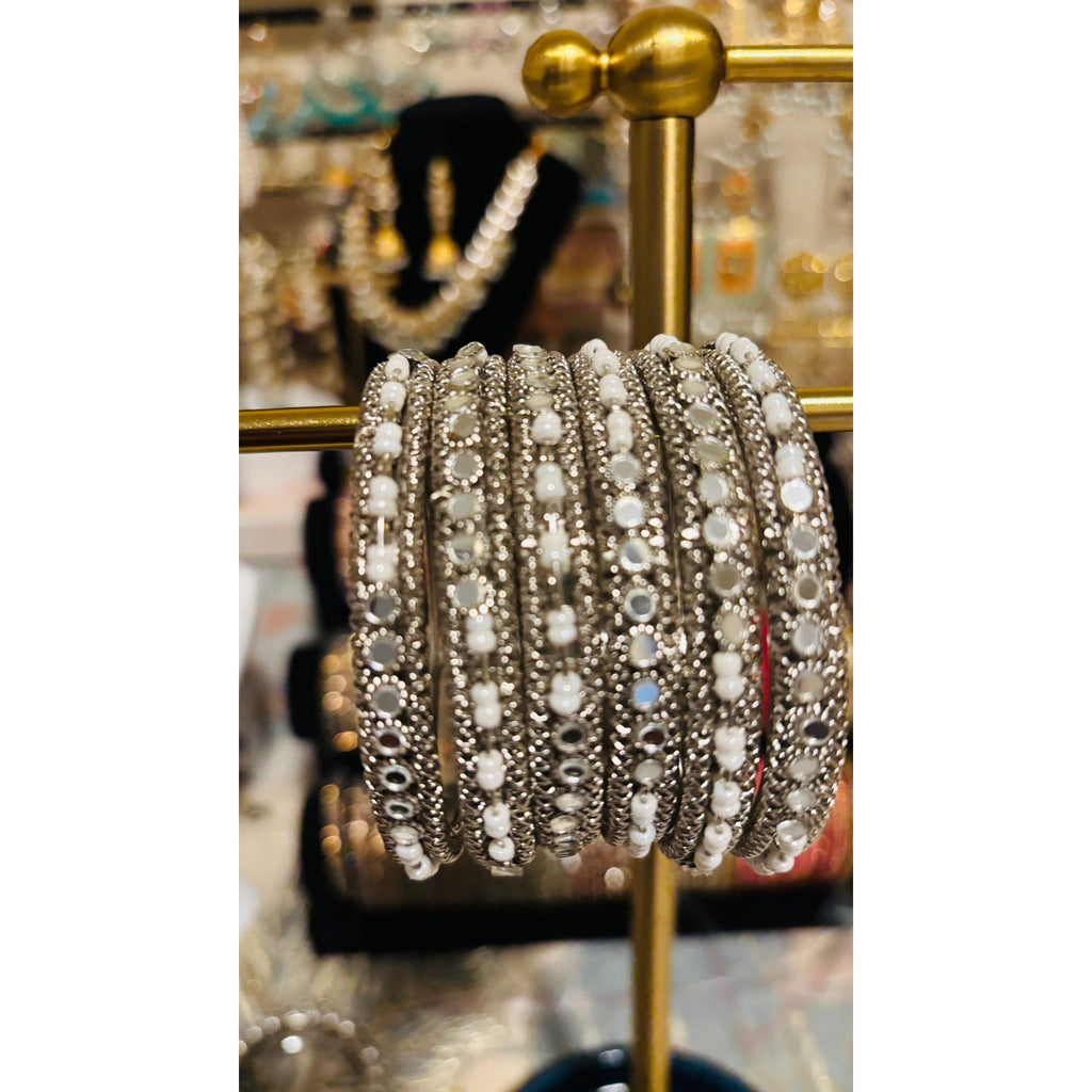 • Clothing: Embroidered/Printed suit for women - Made of best quality fabric - lawn or linen or chiffon - pure silk - Available at Najma Designs & Co. • Jewelry: Gold - plated stud earrings for