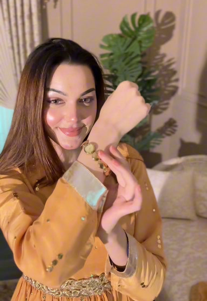 • Clothing: Embroidered/Printed suit for women - Made of best quality fabric - lawn or linen or chiffon - pure silk - Available at Najma Designs & Co. • Jewelry: Gold - plated stud earrings for