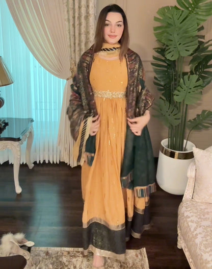 • Clothing: Embroidered/Printed suit for women - Made of best quality fabric - lawn or linen or chiffon - pure silk - Available at Najma Designs & Co. • Jewelry: Gold - plated stud earrings for