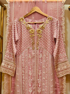 • Clothing: Embroidered/Printed suit for women - Made of best quality fabric - lawn or linen or chiffon - pure silk - Available at Najma Designs & Co. • Jewelry: Gold - plated stud earrings for