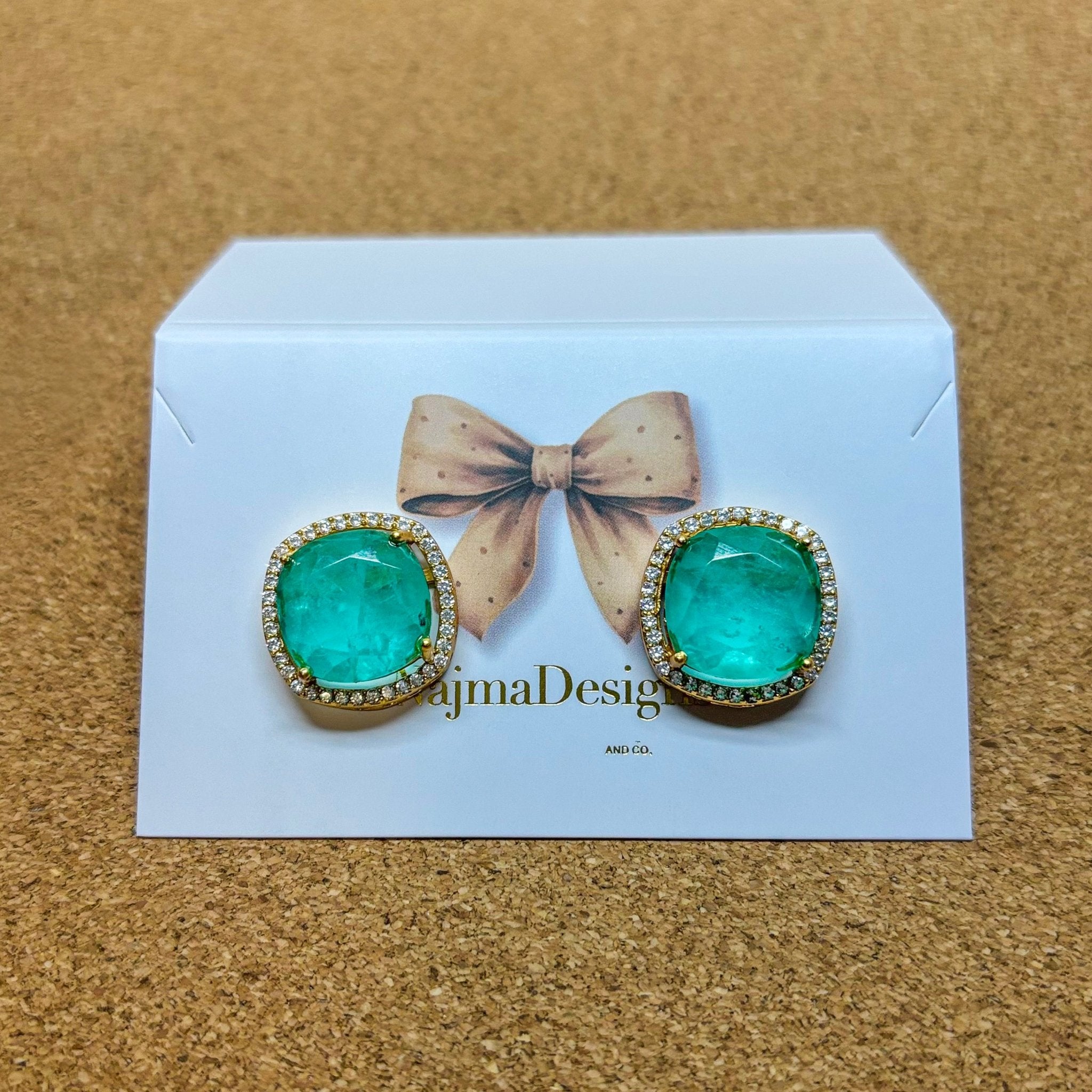 • Clothing: Embroidered/Printed suit for women - Made of best quality fabric - lawn or linen or chiffon - pure silk - Available at Najma Designs & Co. • Jewelry: Gold - plated stud earrings for