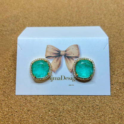 • Clothing: Embroidered/Printed suit for women - Made of best quality fabric - lawn or linen or chiffon - pure silk - Available at Najma Designs & Co. • Jewelry: Gold - plated stud earrings for