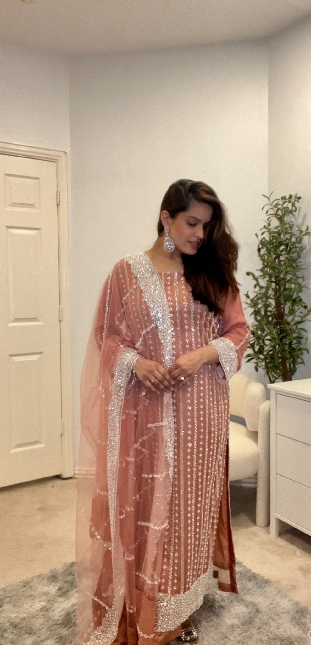 • Clothing: Embroidered/Printed suit for women - Made of best quality fabric - lawn or linen or chiffon - pure silk - Available at Najma Designs & Co. • Jewelry: Gold - plated stud earrings for