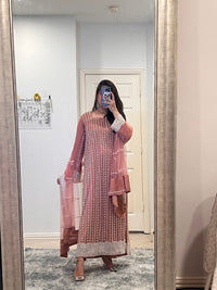 • Clothing: Embroidered/Printed suit for women - Made of best quality fabric - lawn or linen or chiffon - pure silk - Available at Najma Designs & Co. • Jewelry: Gold - plated stud earrings for