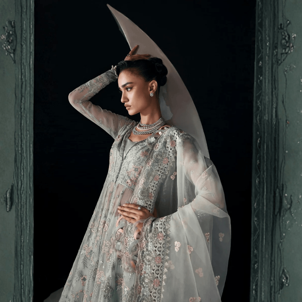 • Clothing: Embroidered/Printed suit for women - Made of best quality fabric - lawn or linen or chiffon - pure silk - Available at Najma Designs & Co. • Jewelry: Gold - plated stud earrings for