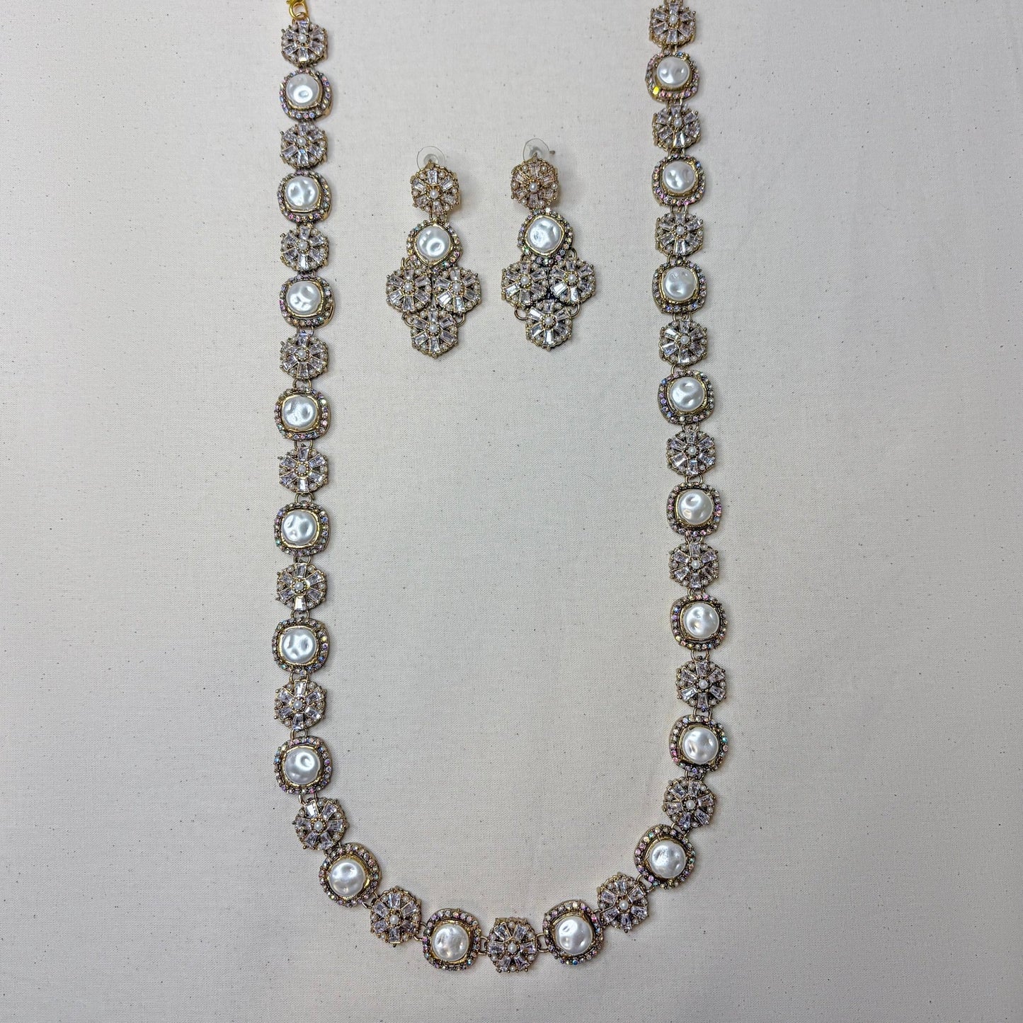 • Clothing: Embroidered/Printed suit for women - Made of best quality fabric - lawn or linen or chiffon - pure silk - Available at Najma Designs & Co. • Jewelry: Gold - plated stud earrings for