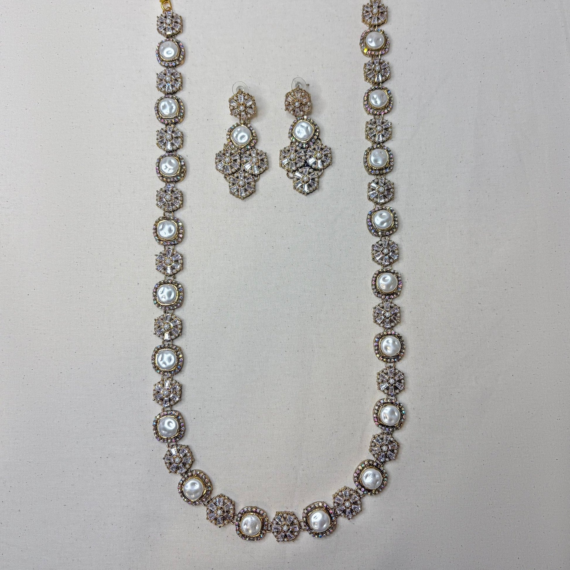 • Clothing: Embroidered/Printed suit for women - Made of best quality fabric - lawn or linen or chiffon - pure silk - Available at Najma Designs & Co. • Jewelry: Gold - plated stud earrings for