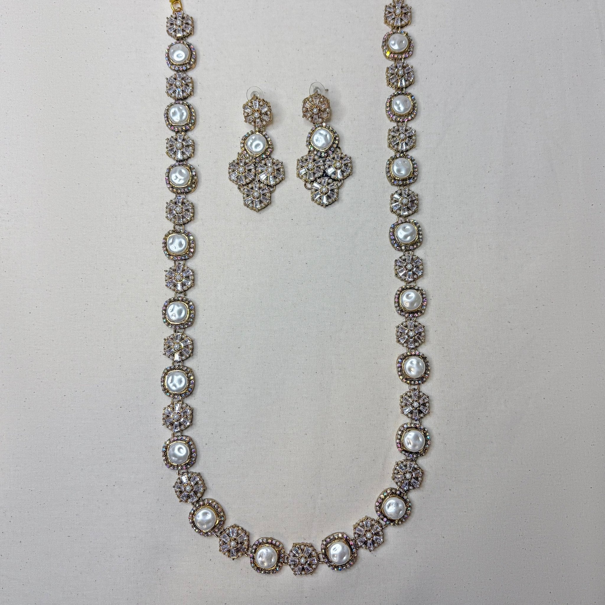 • Clothing: Embroidered/Printed suit for women - Made of best quality fabric - lawn or linen or chiffon - pure silk - Available at Najma Designs & Co. • Jewelry: Gold - plated stud earrings for