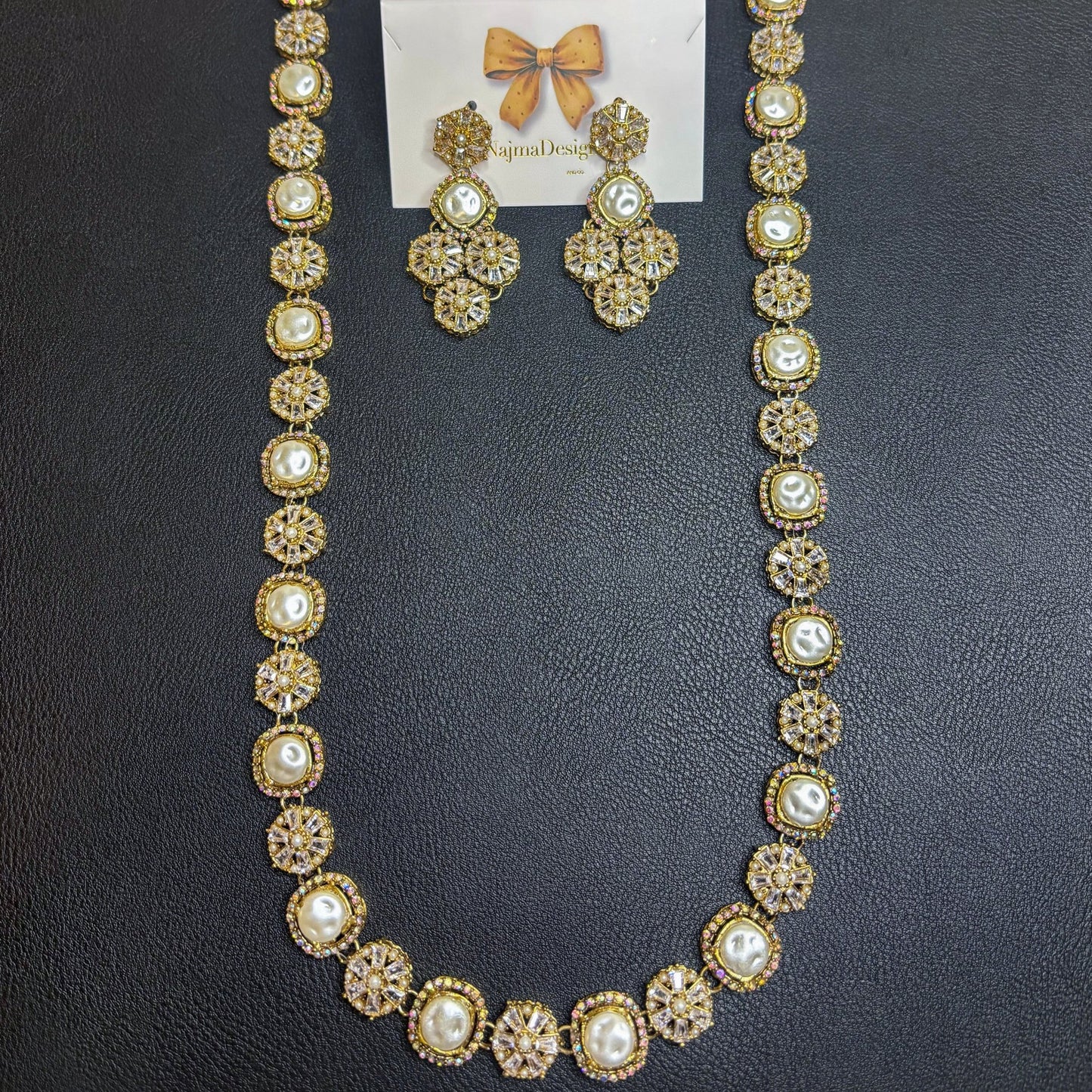 • Clothing: Embroidered/Printed suit for women - Made of best quality fabric - lawn or linen or chiffon - pure silk - Available at Najma Designs & Co. • Jewelry: Gold - plated stud earrings for