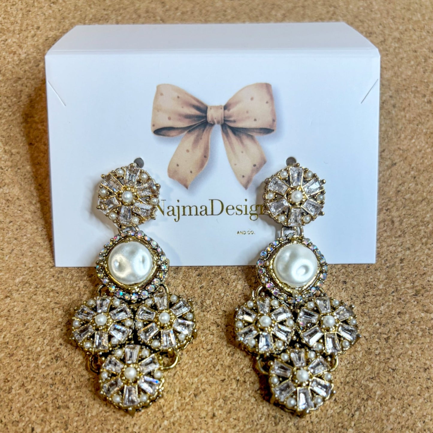 • Clothing: Embroidered/Printed suit for women - Made of best quality fabric - lawn or linen or chiffon - pure silk - Available at Najma Designs & Co. • Jewelry: Gold - plated stud earrings for