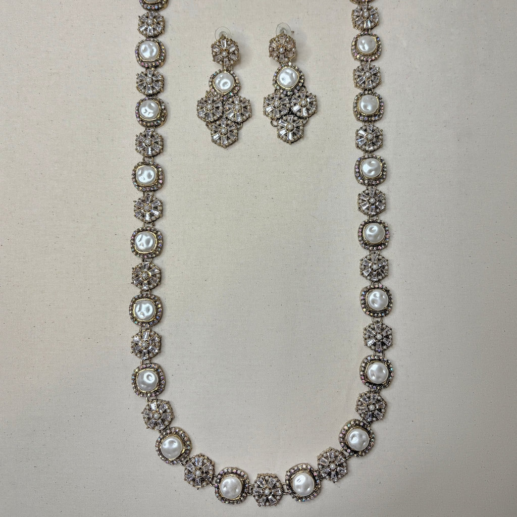 • Clothing: Embroidered/Printed suit for women - Made of best quality fabric - lawn or linen or chiffon - pure silk - Available at Najma Designs & Co. • Jewelry: Gold - plated stud earrings for