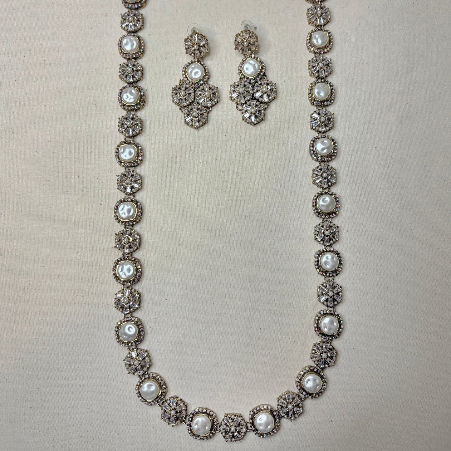 • Clothing: Embroidered/Printed suit for women - Made of best quality fabric - lawn or linen or chiffon - pure silk - Available at Najma Designs & Co. • Jewelry: Gold - plated stud earrings for