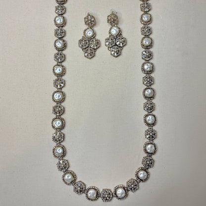 • Clothing: Embroidered/Printed suit for women - Made of best quality fabric - lawn or linen or chiffon - pure silk - Available at Najma Designs & Co. • Jewelry: Gold - plated stud earrings for