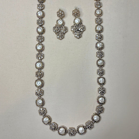 • Clothing: Embroidered/Printed suit for women - Made of best quality fabric - lawn or linen or chiffon - pure silk - Available at Najma Designs & Co. • Jewelry: Gold - plated stud earrings for