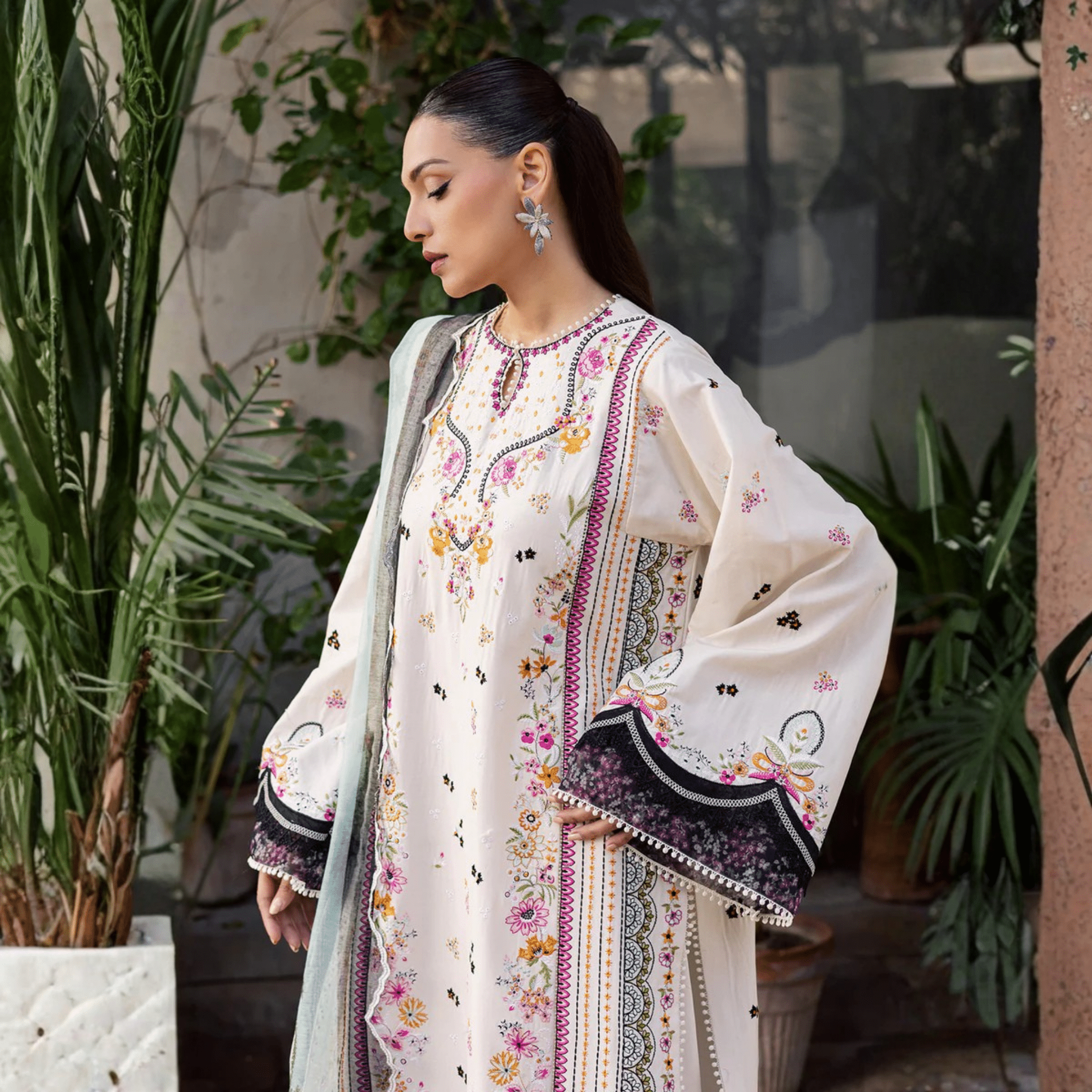 • Clothing: Embroidered/Printed suit for women - Made of best quality fabric - lawn or linen or chiffon - pure silk - Available at Najma Designs & Co. • Jewelry: Gold - plated stud earrings for