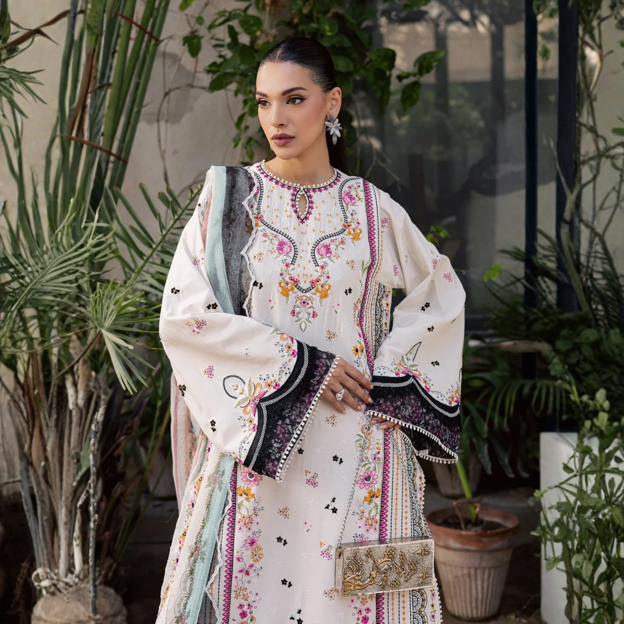 • Clothing: Embroidered/Printed suit for women - Made of best quality fabric - lawn or linen or chiffon - pure silk - Available at Najma Designs & Co. • Jewelry: Gold - plated stud earrings for